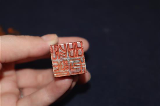 Two Japanese carved wood netsuke and a Chinese soapstone seal
